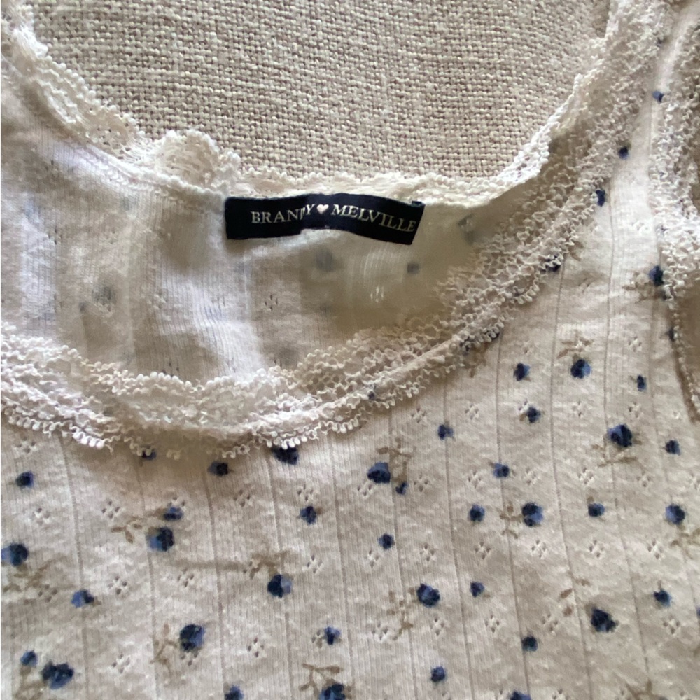 Brandy Melville White Lace Tank Top with Blue Floral Accents